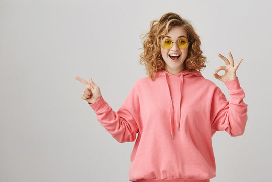 an excited women expressing happiness after he got strong, healthy hair and healthy life style