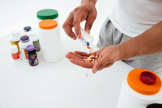 a healtheir pakistani man taking his supplements for wellness purchased from supplements bliss