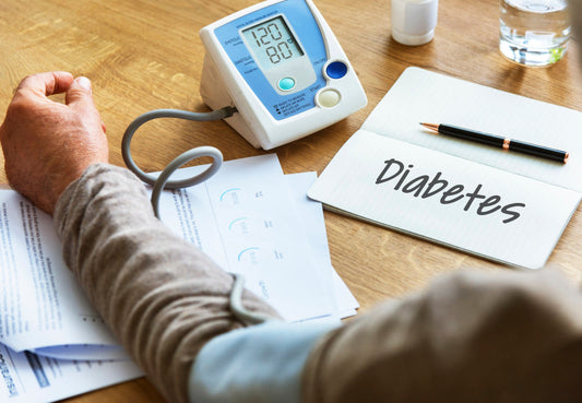 a patient looking at the blood suger level reading machine
